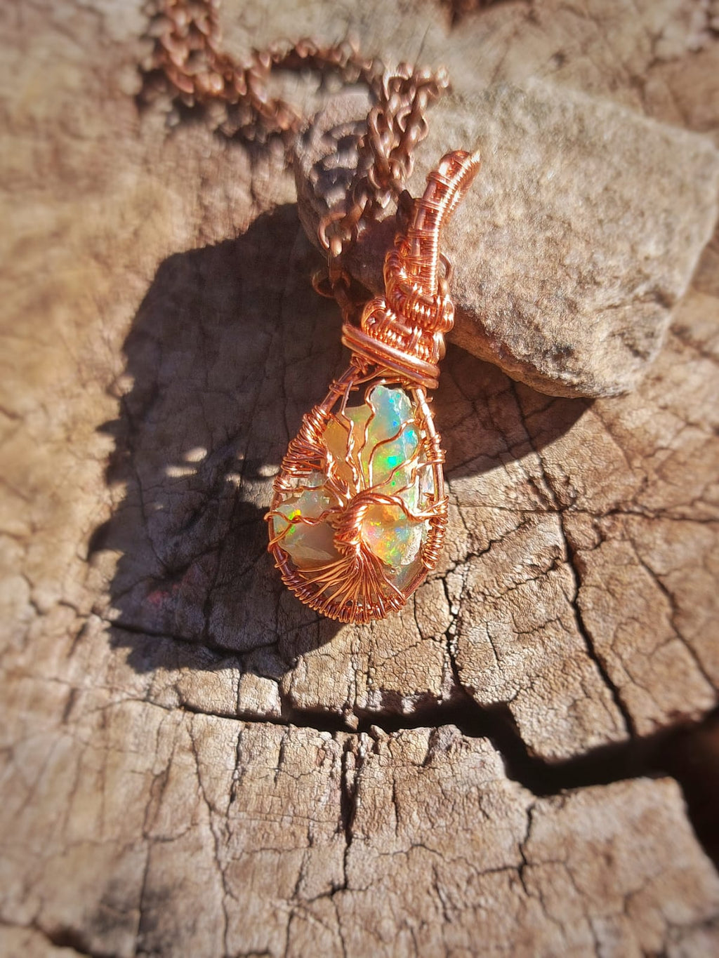 Ethiopian opal Tree of Life pendant wrapped in copper wire