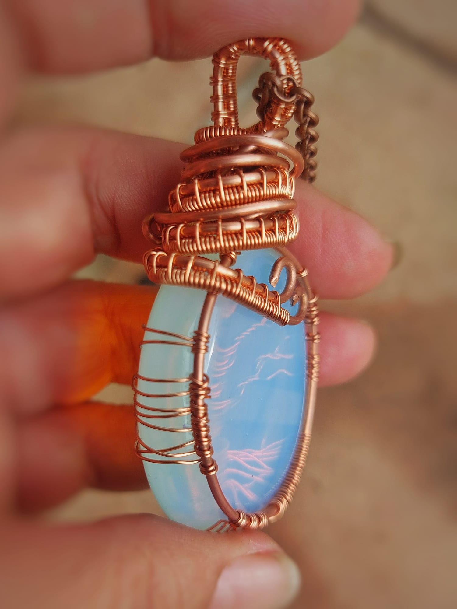 Handcrafted Opalite Tree of Life necklace close-up showing copper wire wrapping details